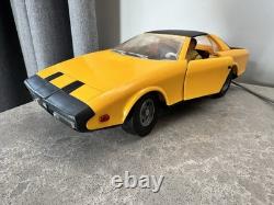 Old remote-controlled Alfa Romeo Alfetta SPIDER with doll box