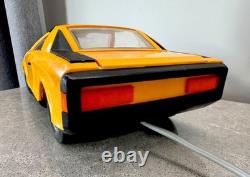 Old remote-controlled Alfa Romeo Alfetta SPIDER with doll box