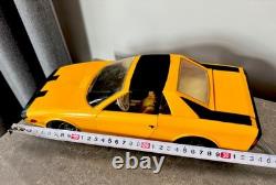 Old remote-controlled Alfa Romeo Alfetta SPIDER with doll box